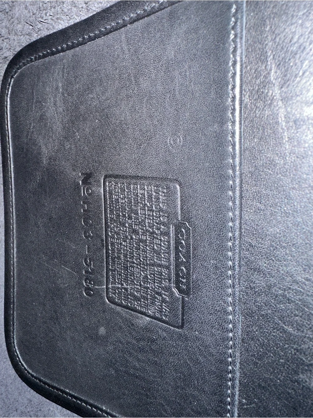 Coach sleek black